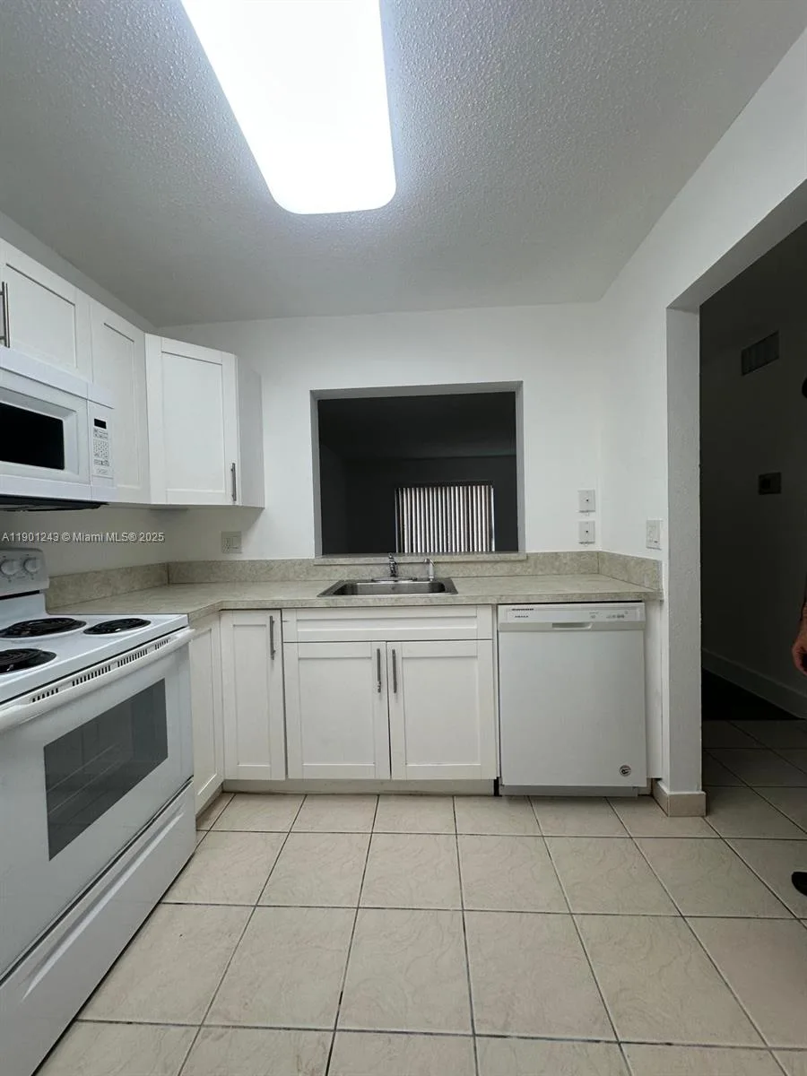 18101 NW 68th Ave # E210, Hialeah, FL 33015 photo 3