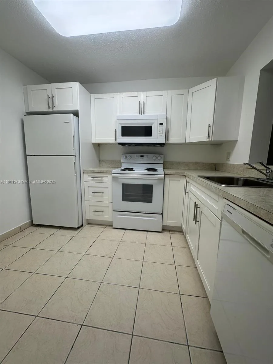 18101 NW 68th Ave # E210, Hialeah, FL 33015 photo 4