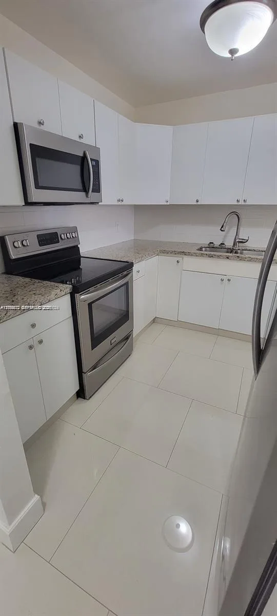 6970 NW 186th St # 3-502, Hialeah, FL 33015 photo 2