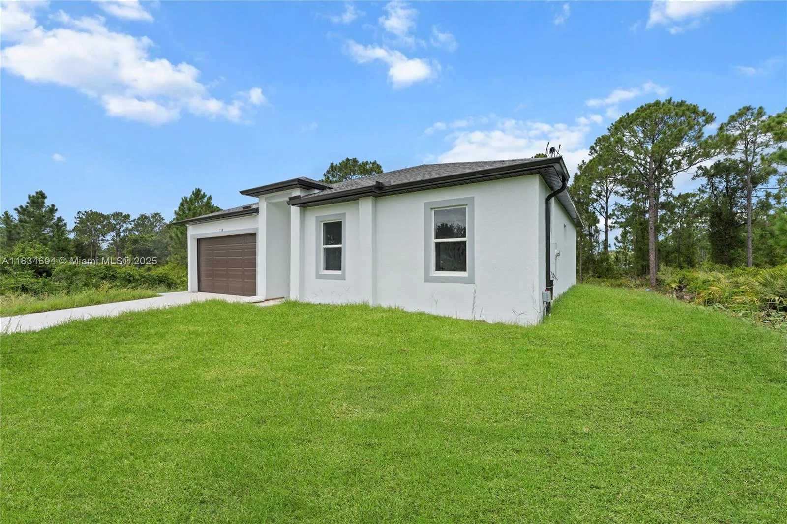 718 Drury Ave, Lehigh Acres, FL 33974 photo 2