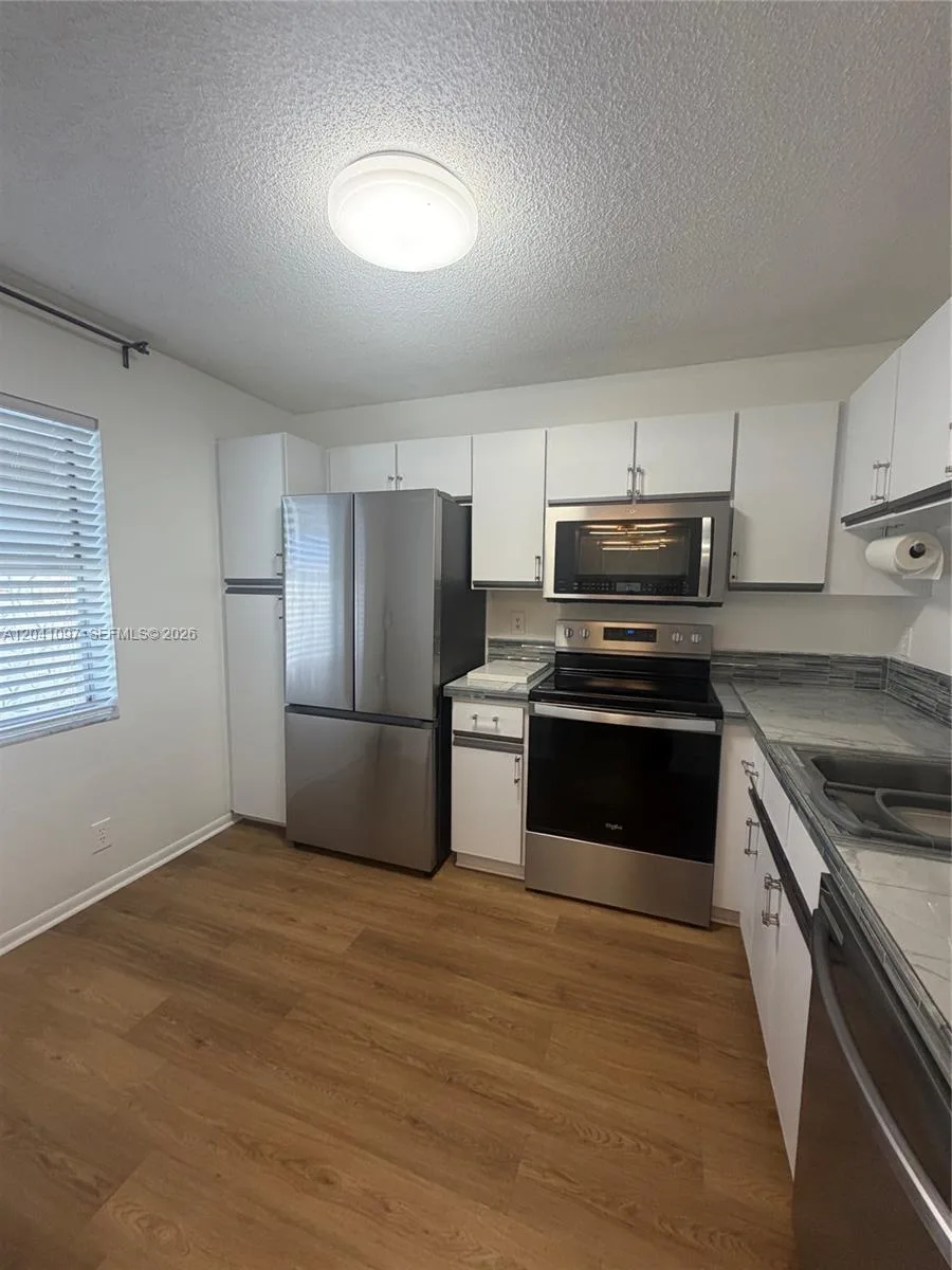 3031 Holiday Springs Blvd # 205-7, Margate, FL 33063 photo 2