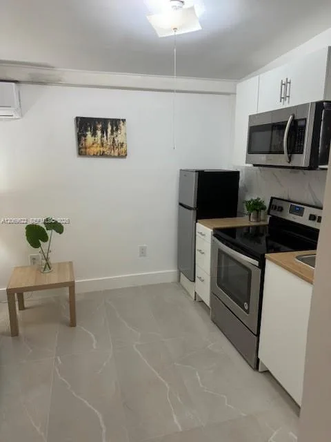 1270 NE 210th Ter # B, Miami, FL 33179 photo 2