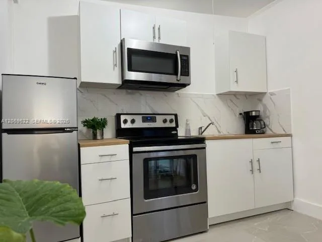 1270 NE 210th Ter # B, Miami, FL 33179 photo 3
