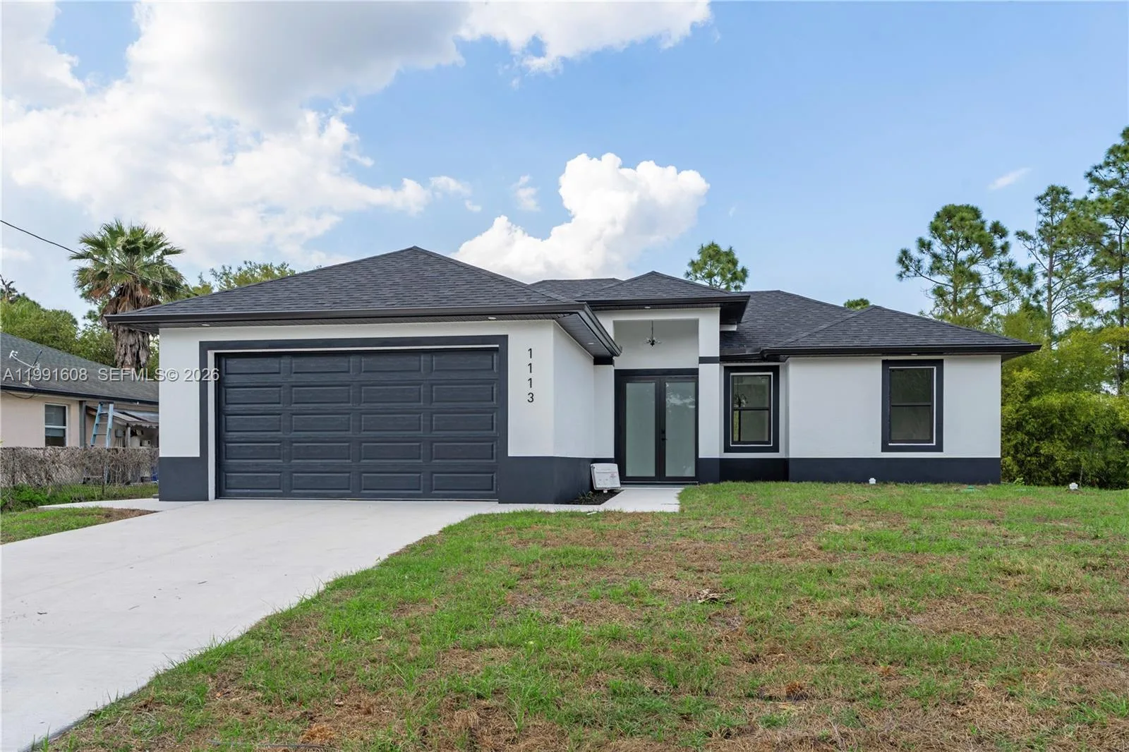 1113 ENRIQUE ST E, Lehigh Acres, FL 33974 photo 2