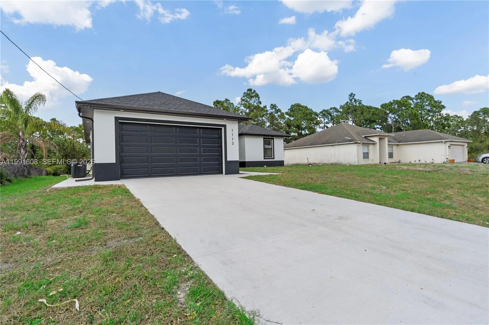 1113 ENRIQUE ST E, Lehigh Acres, FL 33974 photo 3