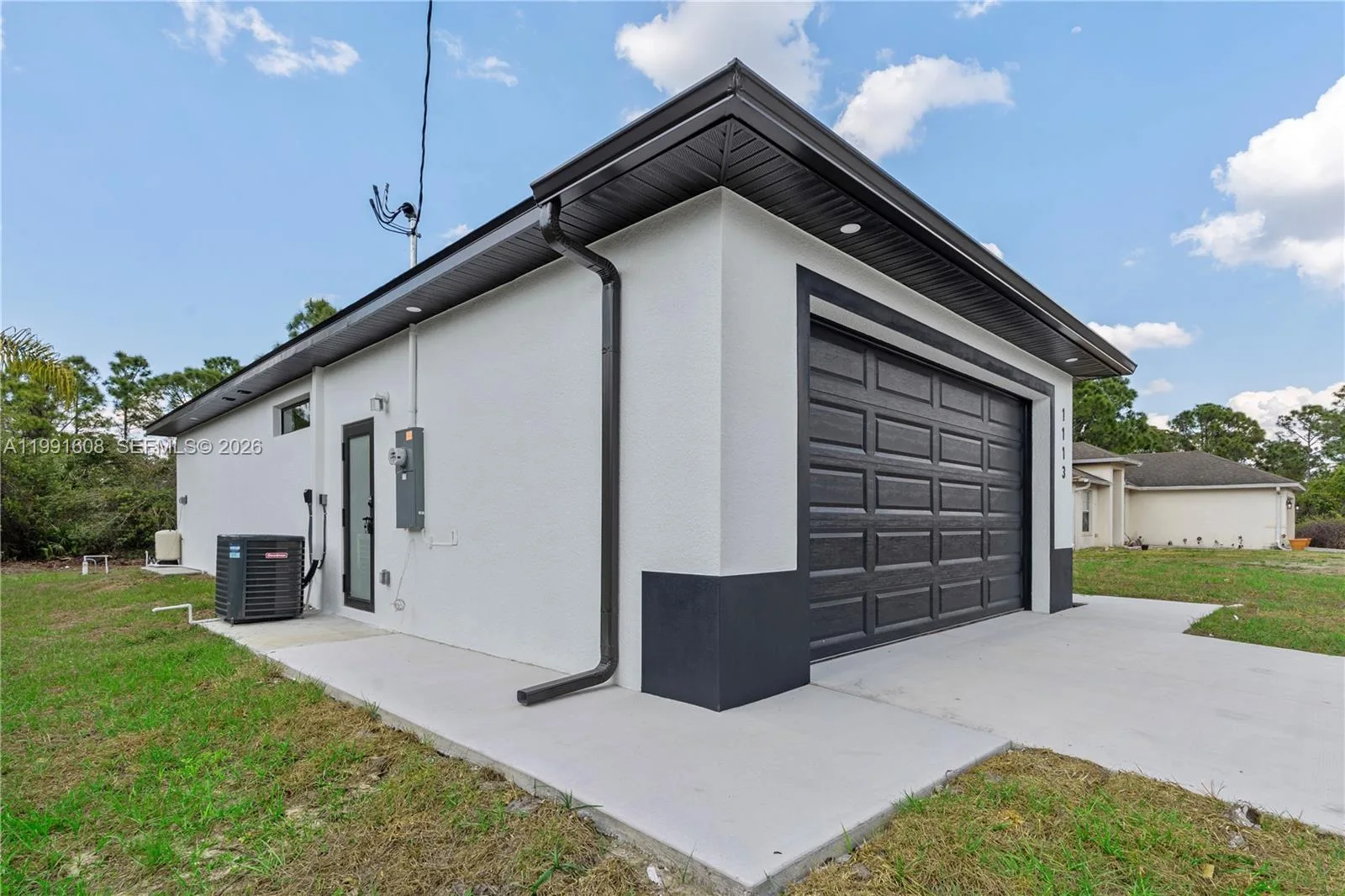 1113 ENRIQUE ST E, Lehigh Acres, FL 33974 photo 4
