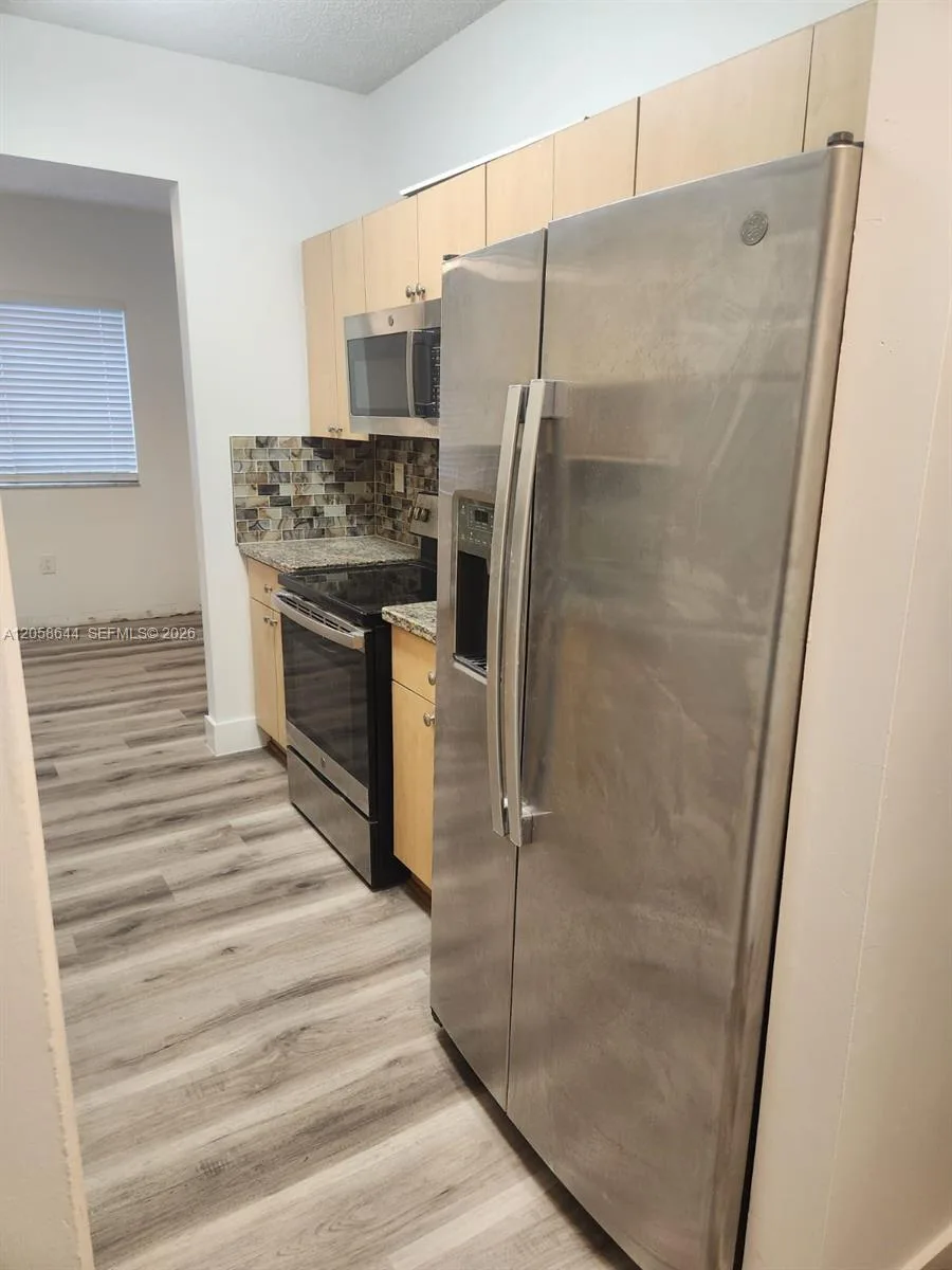 7085 Nova Dr # 102, Davie, FL 33317 photo 4