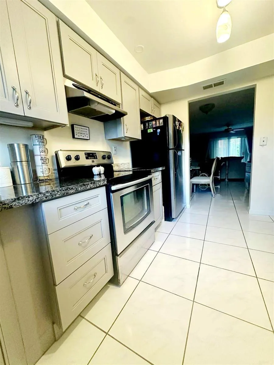 3475 Broken Woods Drive # 101, Coral Springs, FL 33065 photo 4