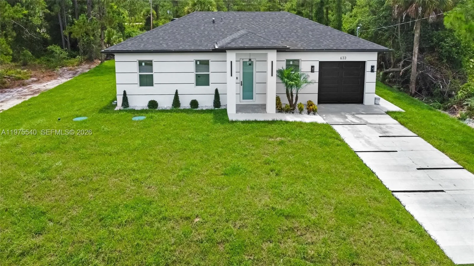 633 S WABASSO, Lehigh Acres, FL 33974 photo 2