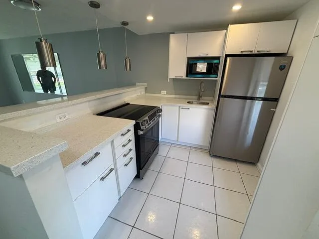 6200 NW 62ND Street # 105, Tamarac, FL 33319