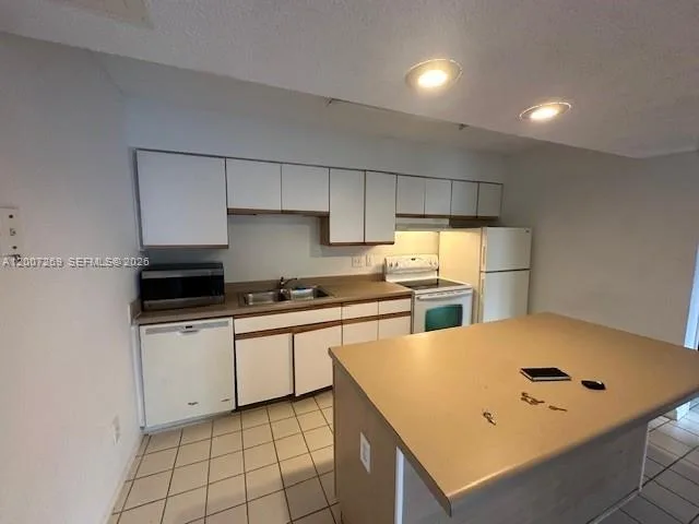 3985 W Mcnab Rd # A111, Pompano Beach, FL 33069 photo 2