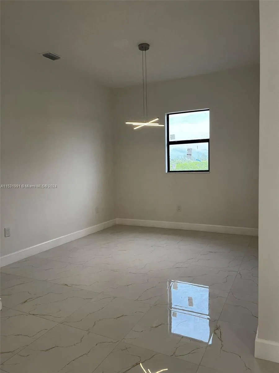 1054 Fayette Ave, Lehigh Acres, FL 33974 photo 4