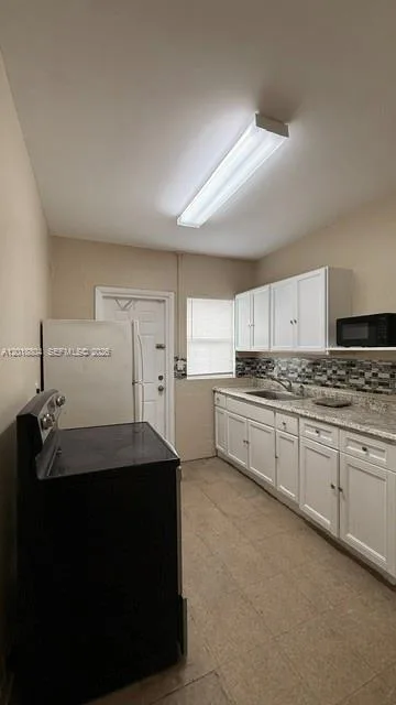 646 NW 14th Ter # APT WEST, Fort Lauderdale, FL 33311 photo 12