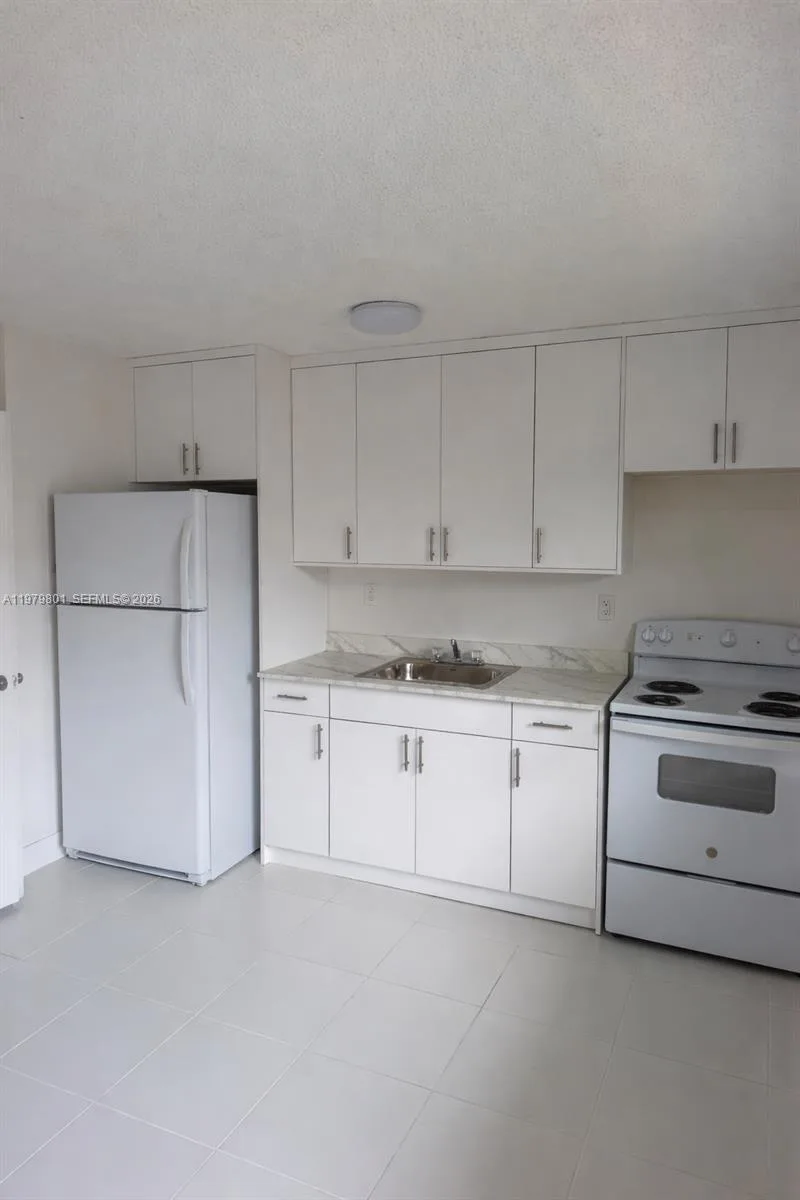 1077 NW 45th Ave # 0, Miami, FL 33126 photo 2