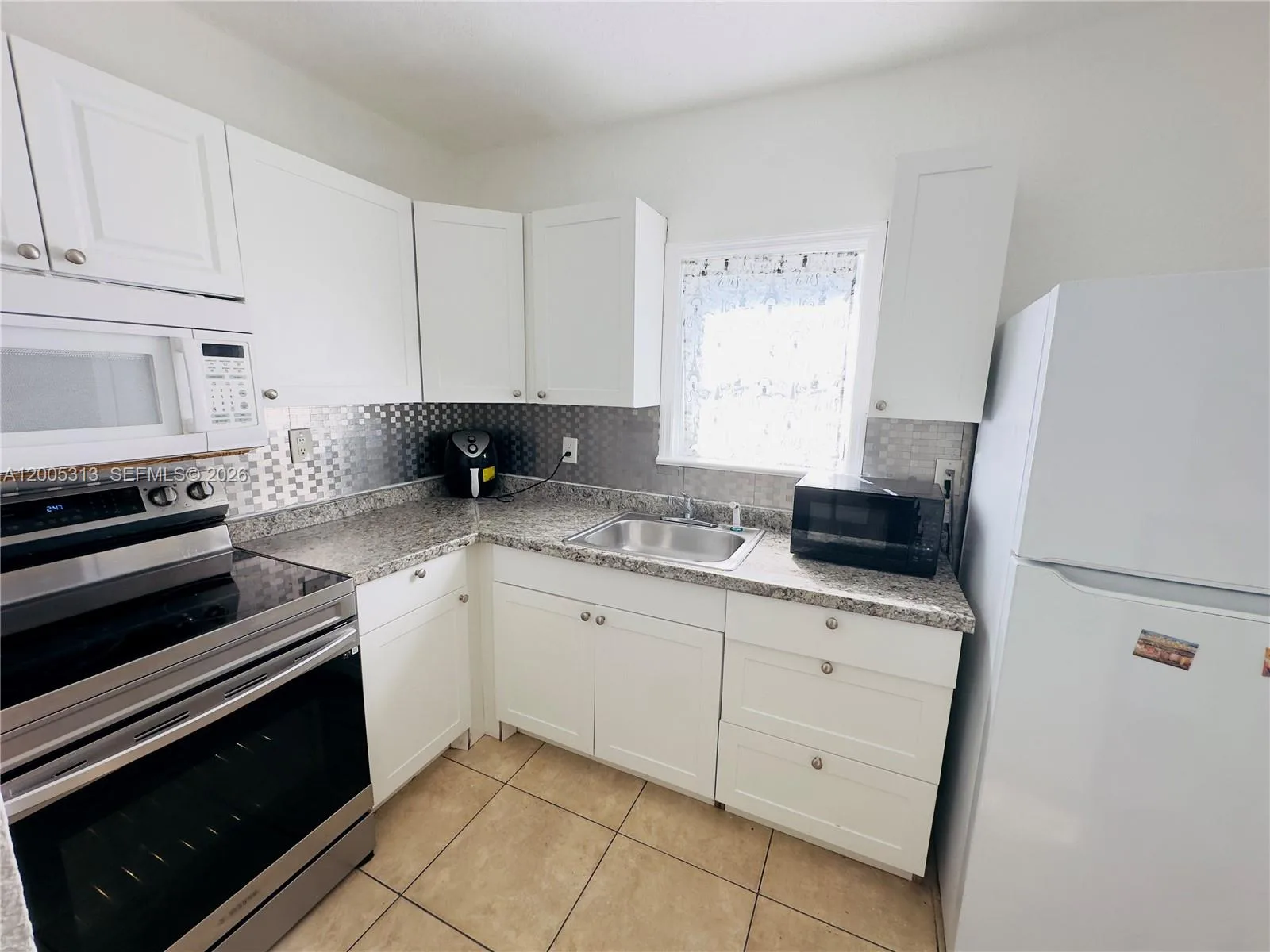 301 NW 37th St # CU2, Miami, FL 33127 photo 3