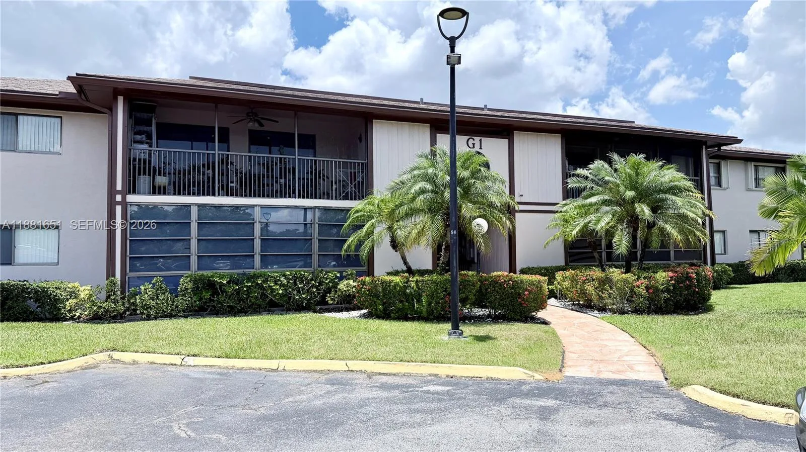 9794 N Belfort Cir # 202, Tamarac, FL 33321 photo 2