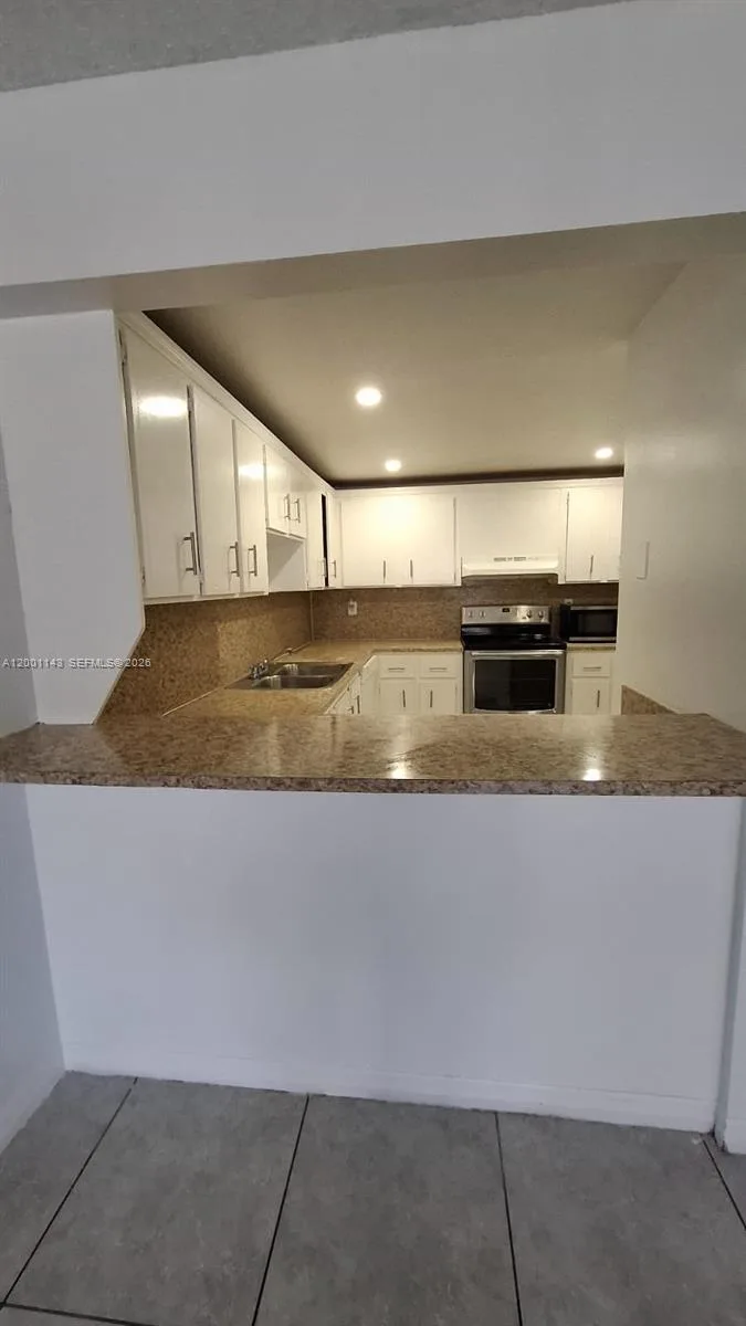6950 Miami Gardens Dr # 2-201, Hialeah, FL 33015
