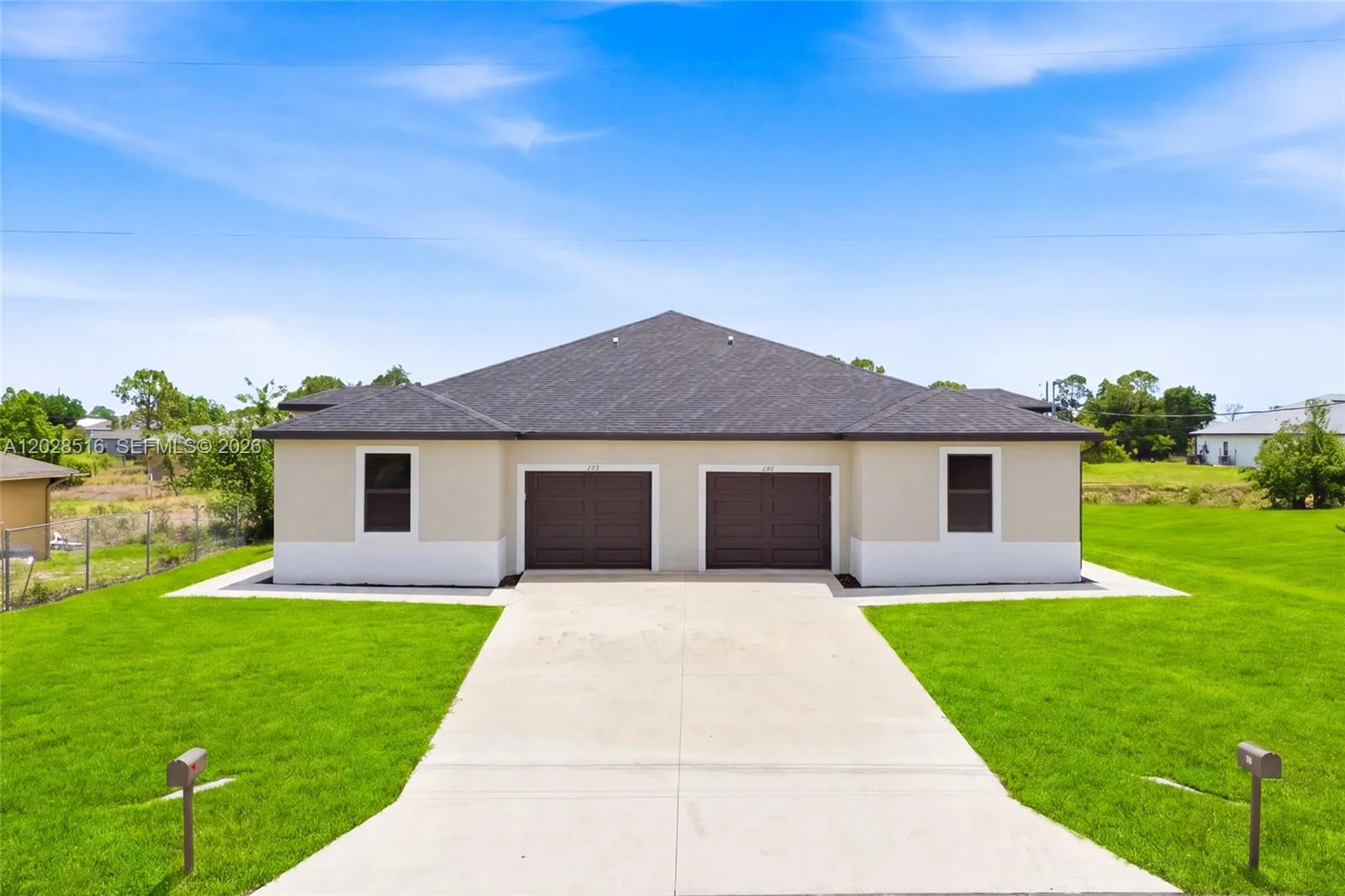 225/227 Hightower AVE S, Lehigh Acres, FL 33973