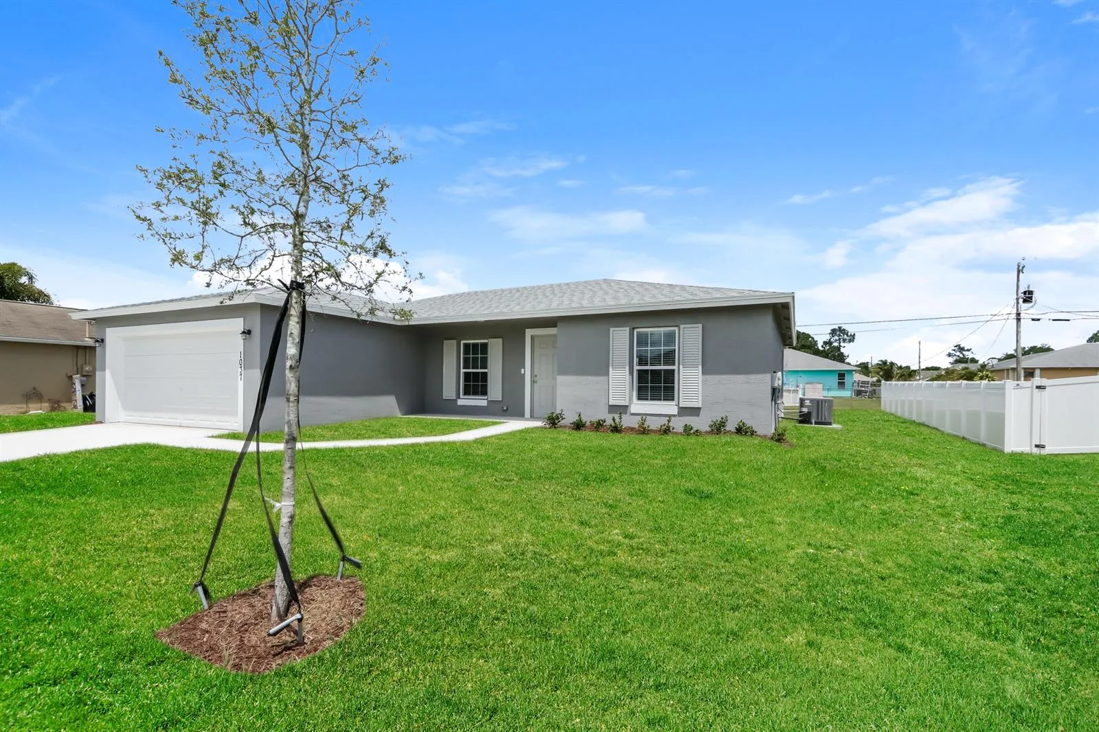 1037 SW SUDDER Avenue, Port St. Lucie, FL 34953 photo 2