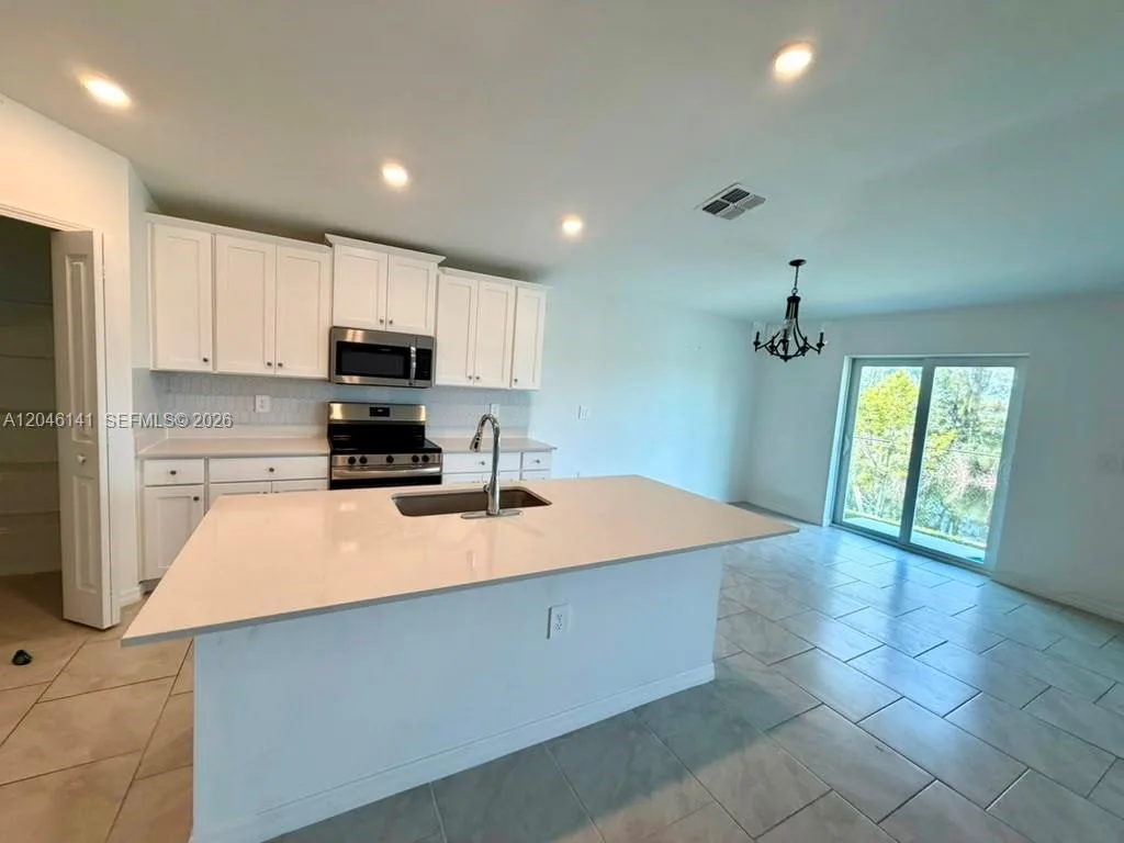 4104 NE 12TH CT, Cape Coral, FL 33909 photo 7