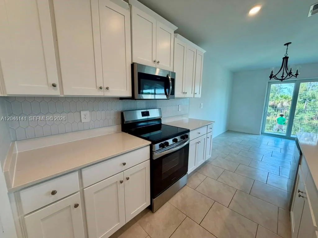 4104 NE 12TH CT, Cape Coral, FL 33909 photo 8