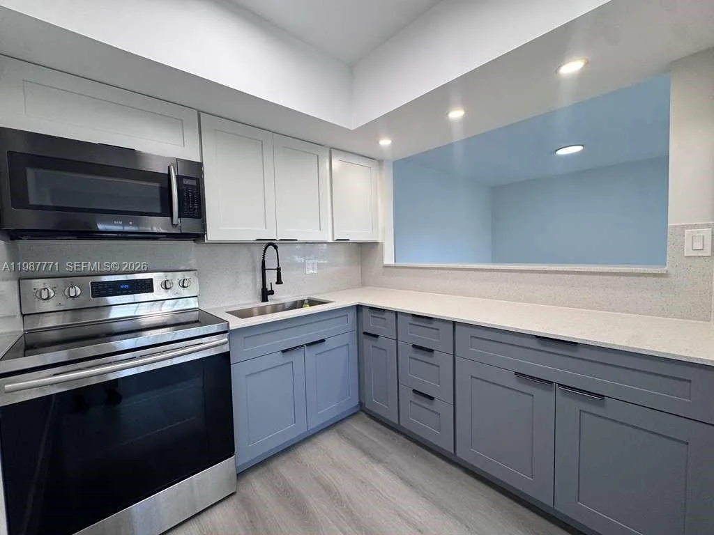 455 Golden Isles Dr # 203, Hallandale Beach, FL 33009 photo 2