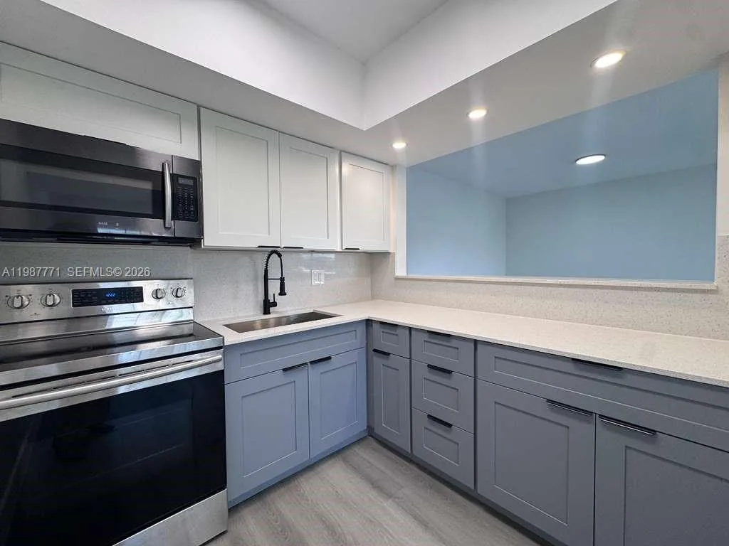 455 Golden Isles Dr # 203, Hallandale Beach, FL 33009 photo 4