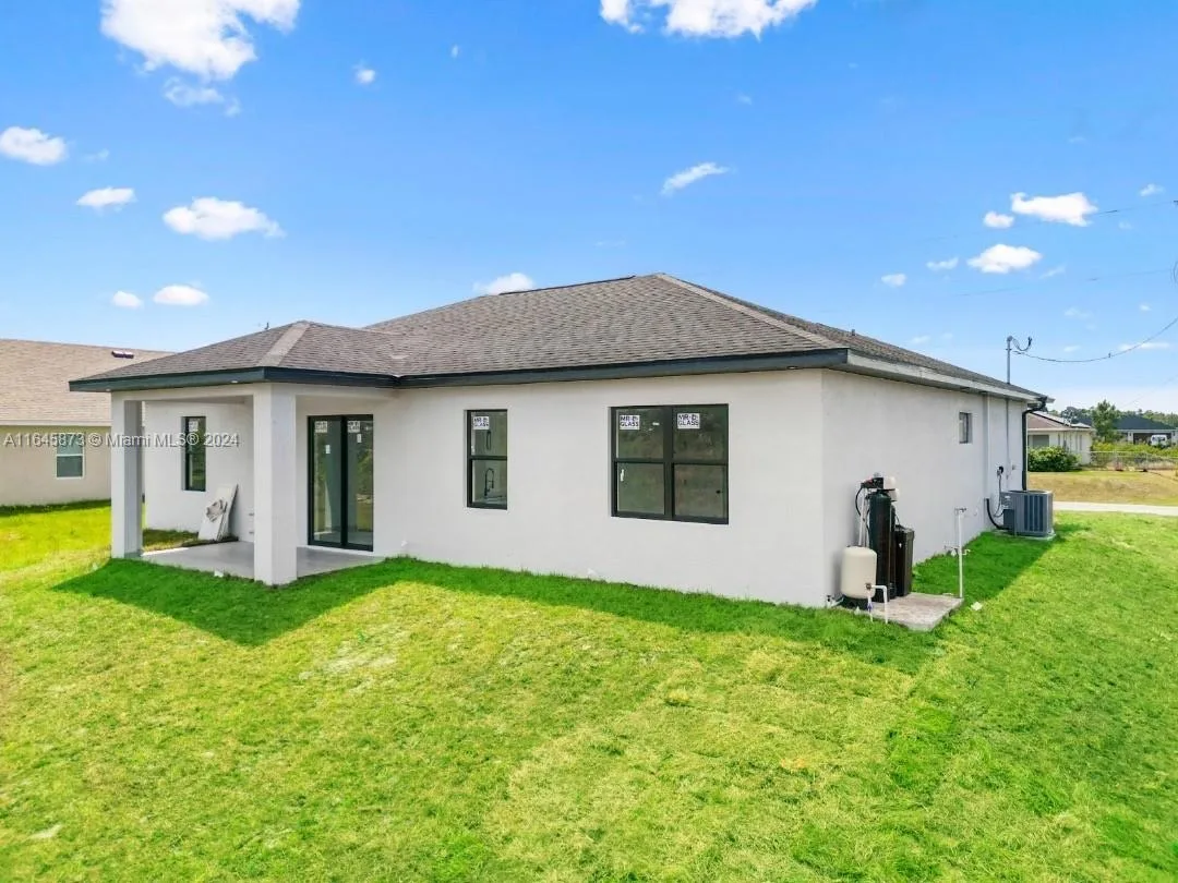 447 Paddock St, Lehigh Acres, FL 33974 photo 3