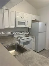 2451 NW 56th Ave # 1-205, Lauderhill, FL 33313