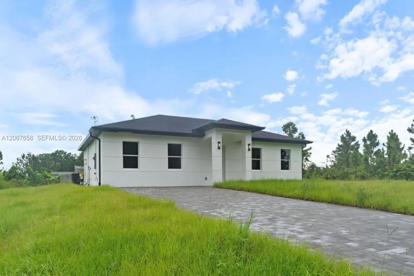 710 Peacock Ave, Lehigh Acres, FL 33974 photo 2