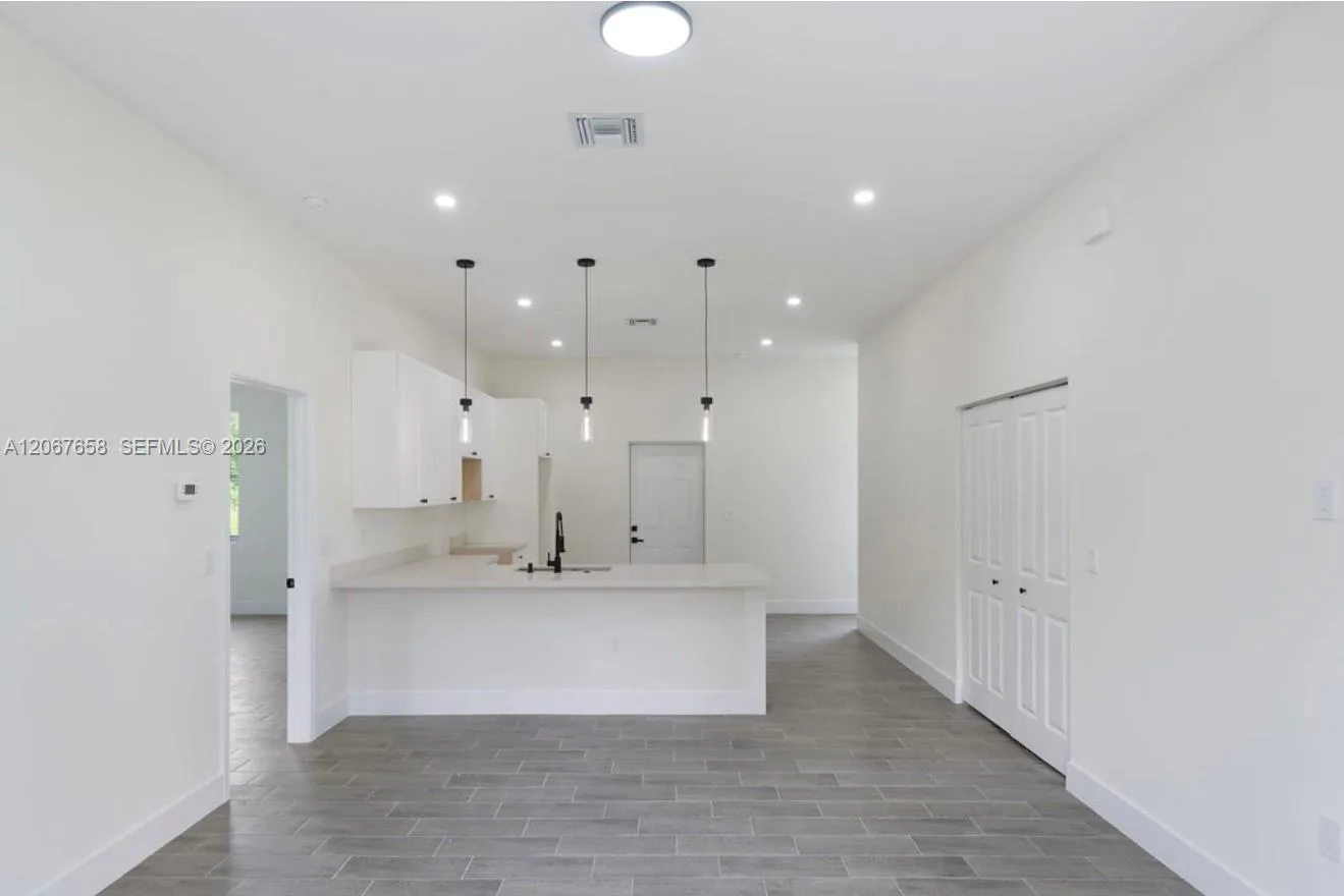 710 Peacock Ave, Lehigh Acres, FL 33974 photo 4
