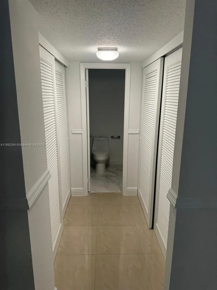 18101 NW 68th Ave # D207, Hialeah, FL 33015 photo 13