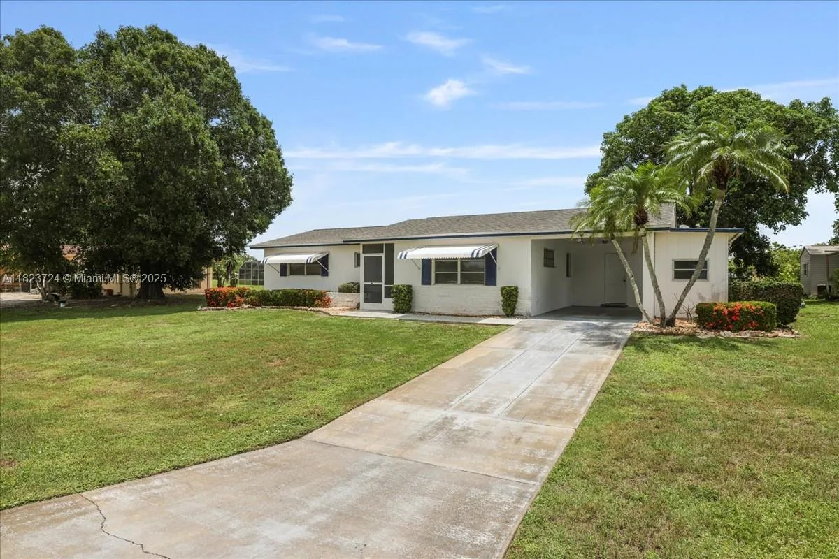 216 Rockcliff Ave, Lehigh Acres, FL 33936 photo 2