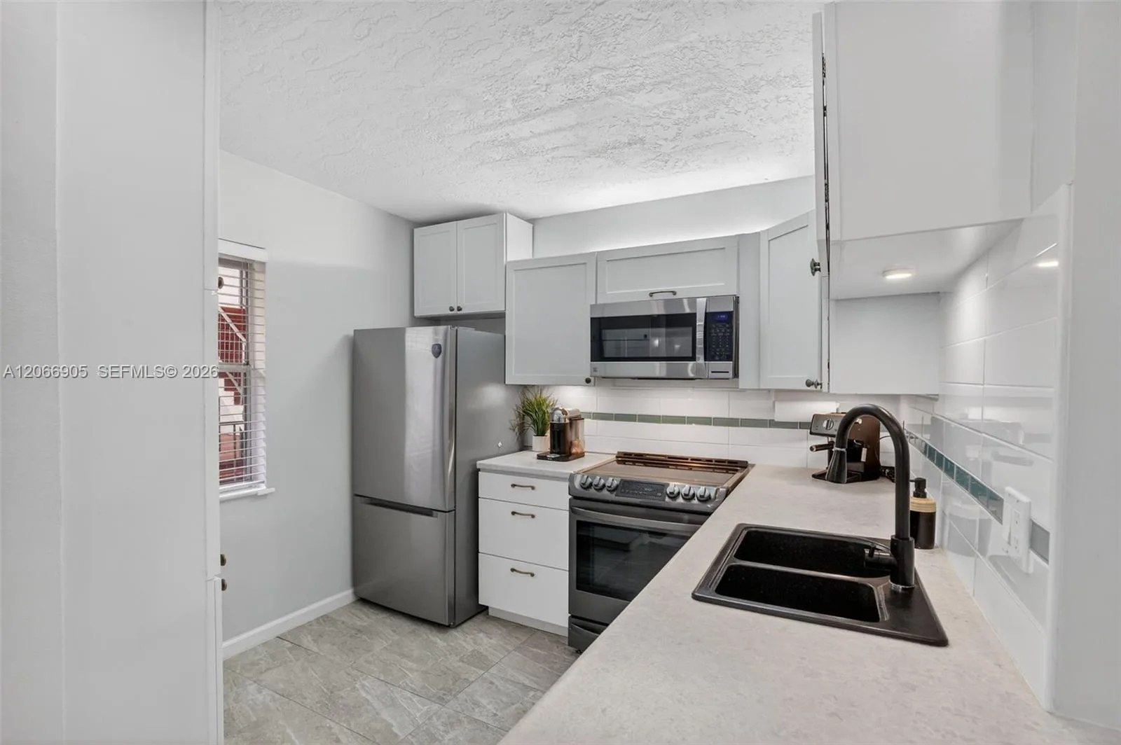2801 Somerset Dr # 205, Lauderdale Lakes, FL 33311 photo 11