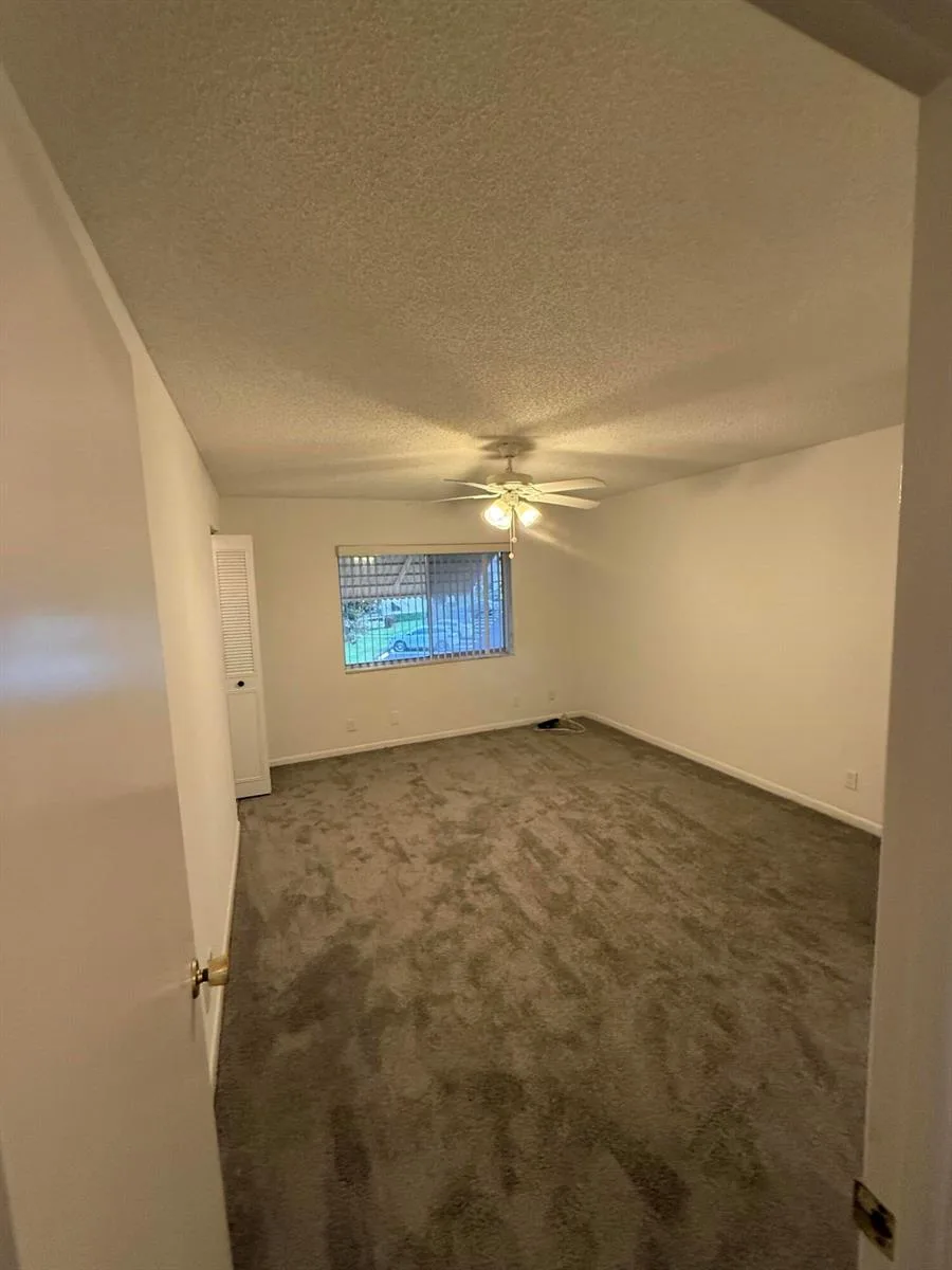 5795 La Pinata Boulevard # C-2, FL 33463 — photo 2 of 10