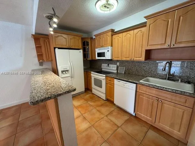 7915 SW 104th St # 104G, Miami, FL 33156 photo 3