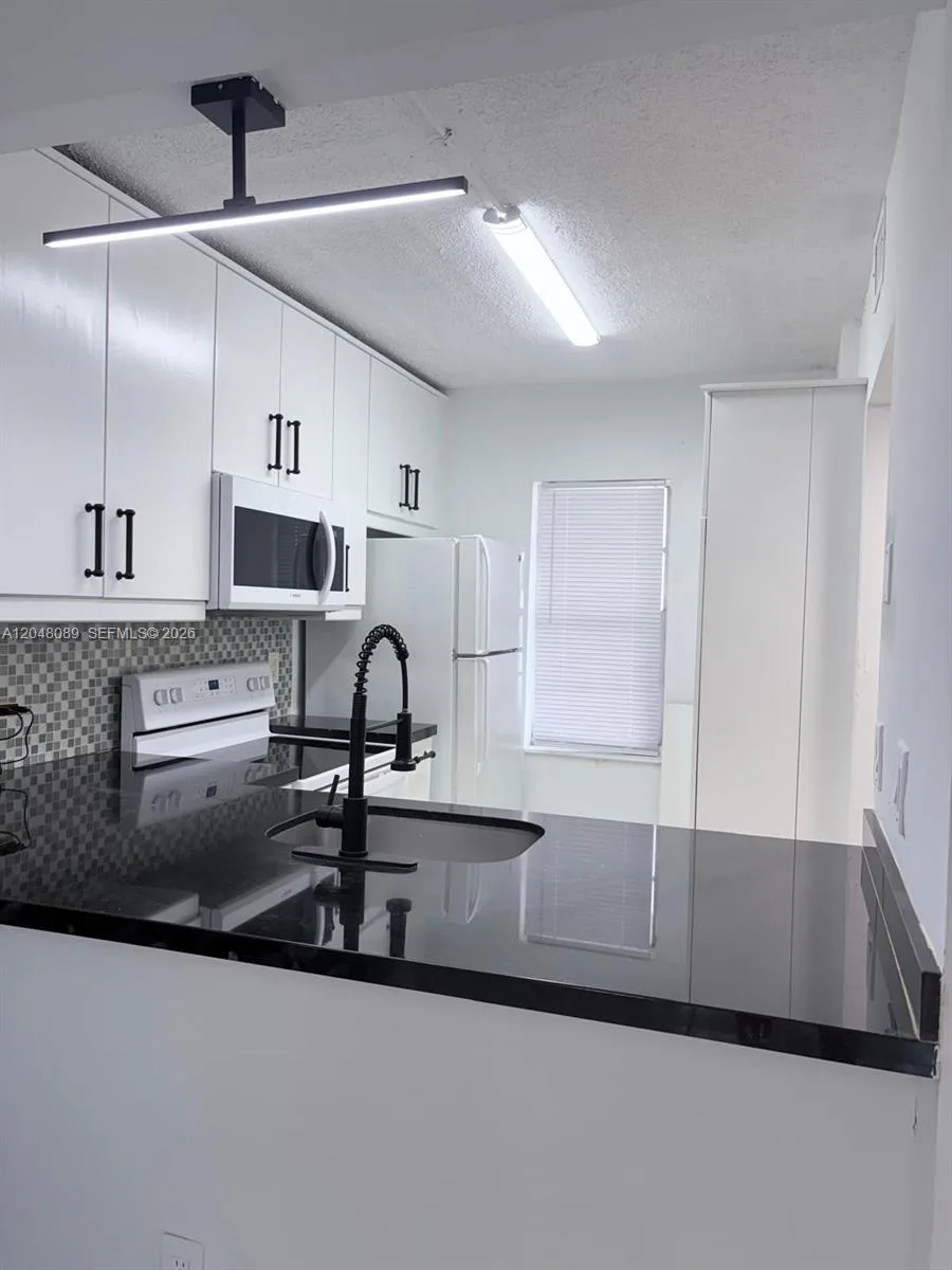 8305 Royal Palm Blvd # 103, Coral Springs, FL 33065
