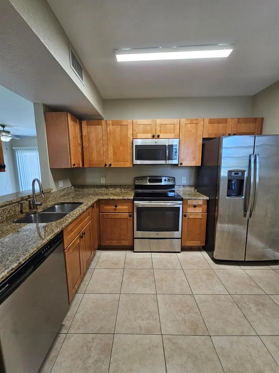 1049 GOLDEN LAKES Boulevard # 115, West Palm Beach, FL 33411 photo 3