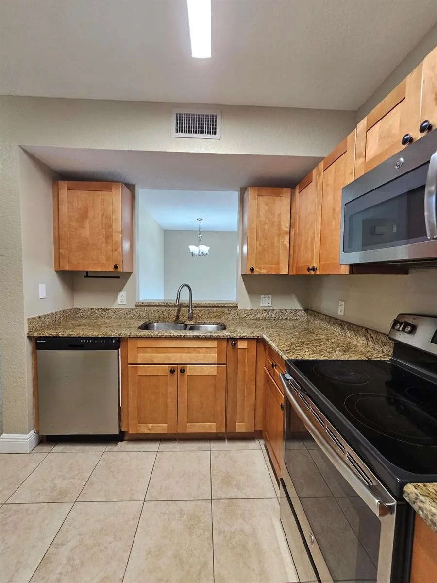 1049 GOLDEN LAKES Boulevard # 115, West Palm Beach, FL 33411 photo 5