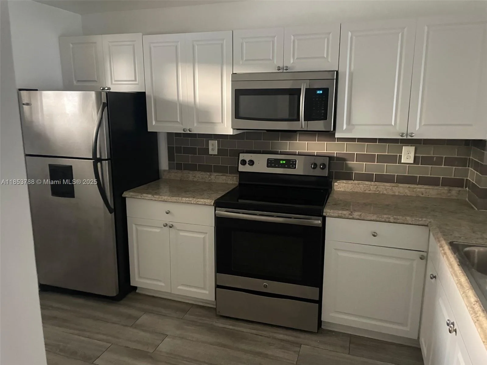 1075 Riverside Dr # 203, Coral Springs, FL 33071 photo 2