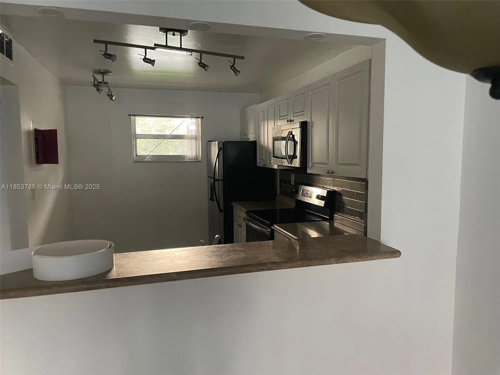 1075 Riverside Dr # 203, Coral Springs, FL 33071 photo 4