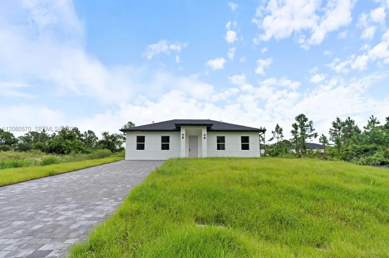 708 PEACOCK AVE, Lehigh Acres, FL 33974