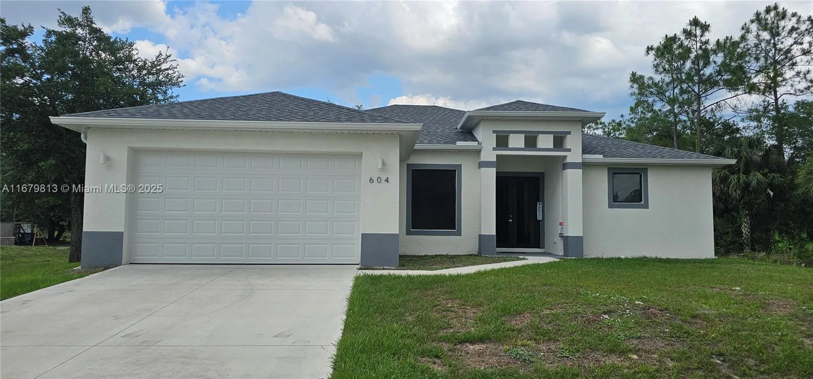 604 LAKE AVE, Lehigh Acres, FL 33972