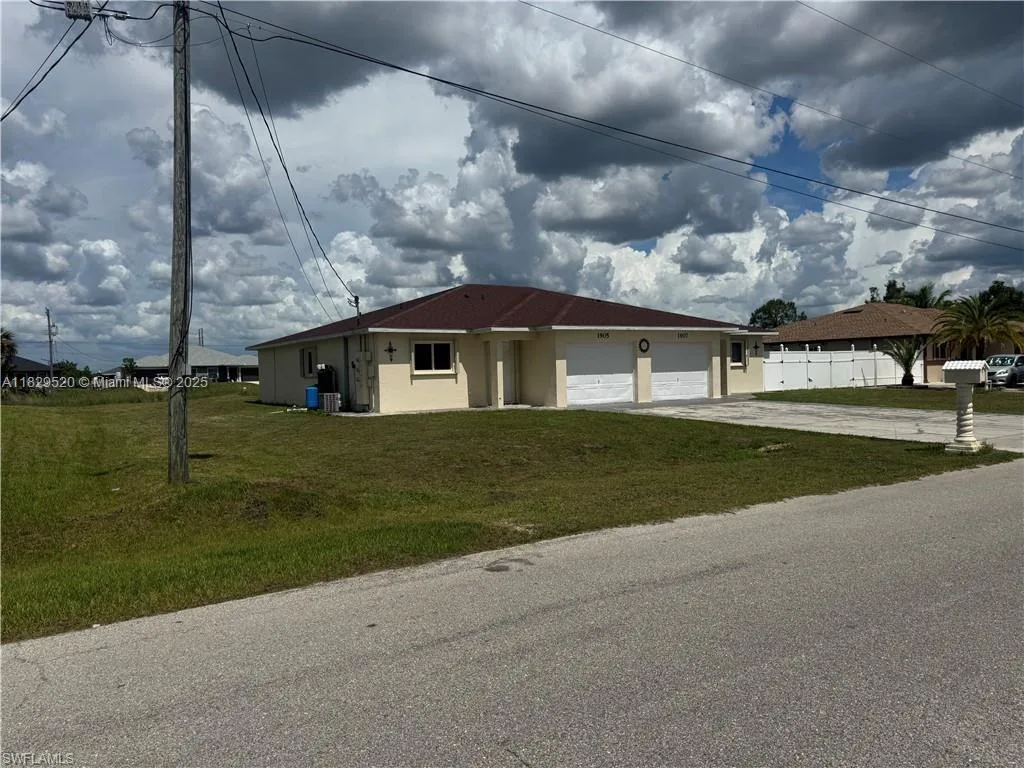 1905/1907 Gordon Ave S, Lehigh Acres, FL 33973 photo 2