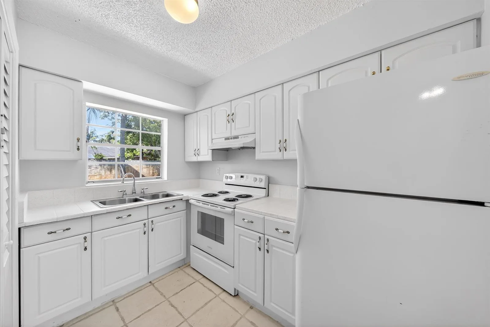 121 NW 56th Court # 1-2, Oakland Park, FL 33309 photo 4