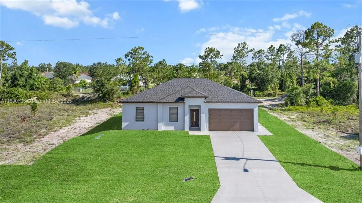 1212 Edelweiss St E, Lehigh Acres, FL 33974 photo 2