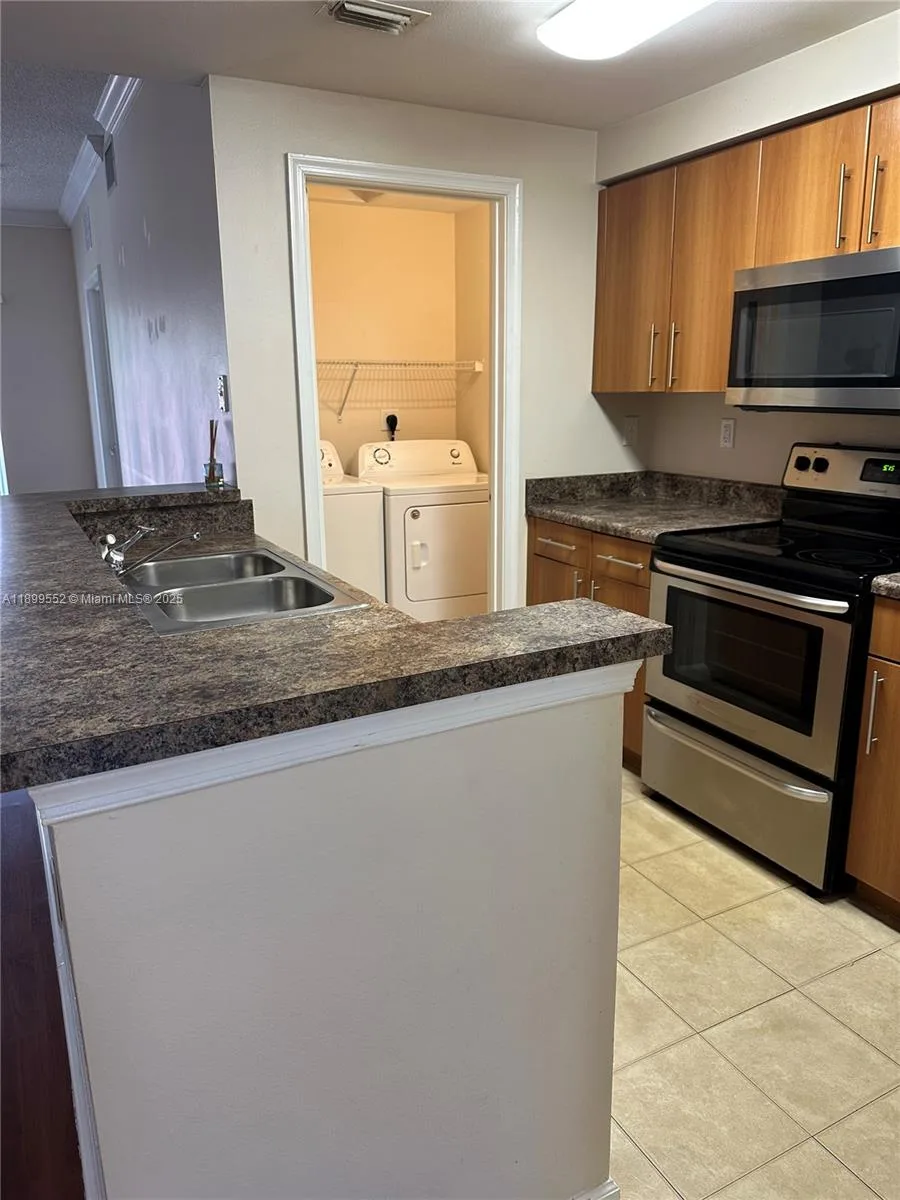 5840 W Sample Rd # 306, Coral Springs, FL 33067 photo 3