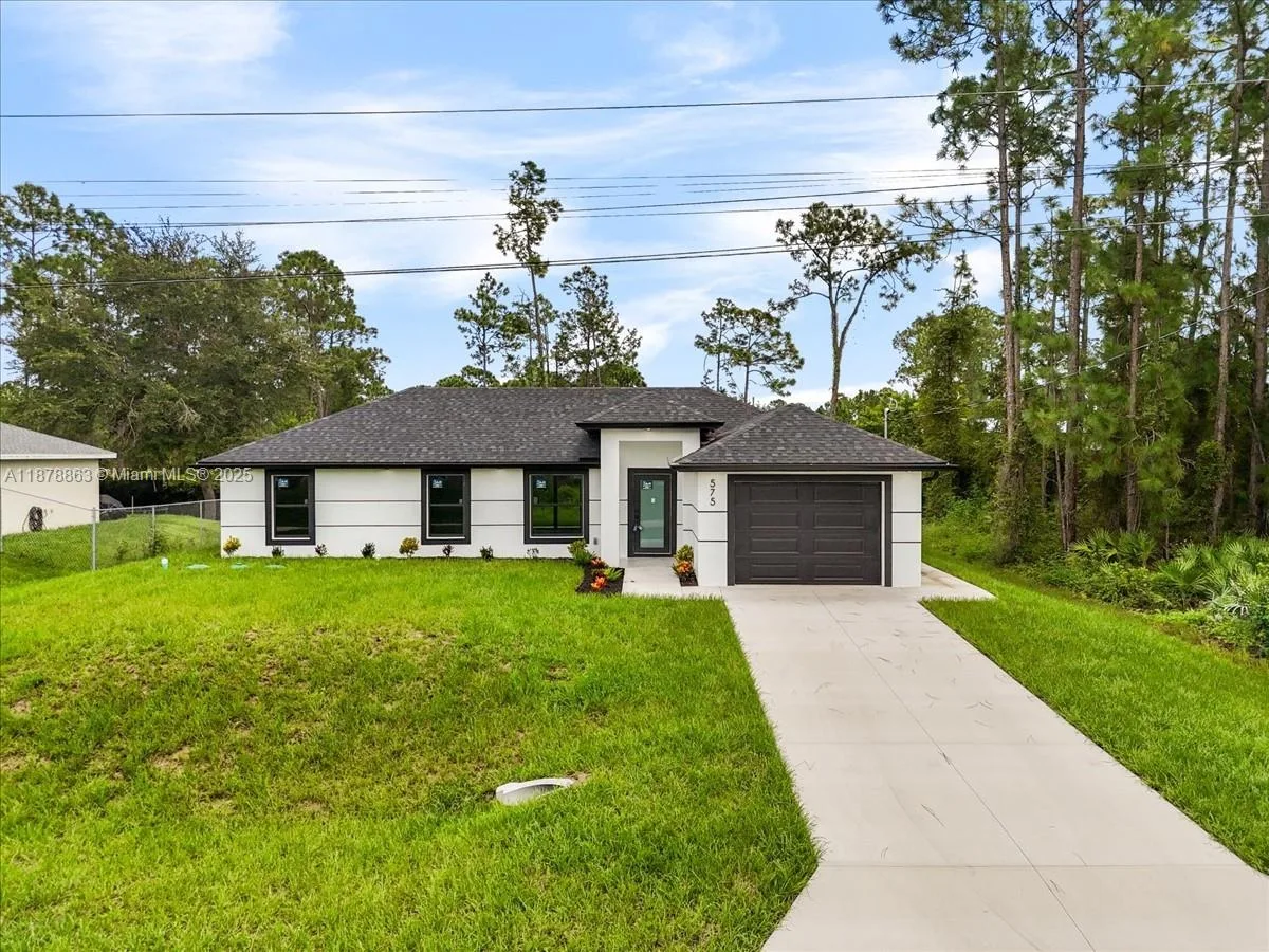 575 Beach Ave S, Lehigh Acres, FL 33974