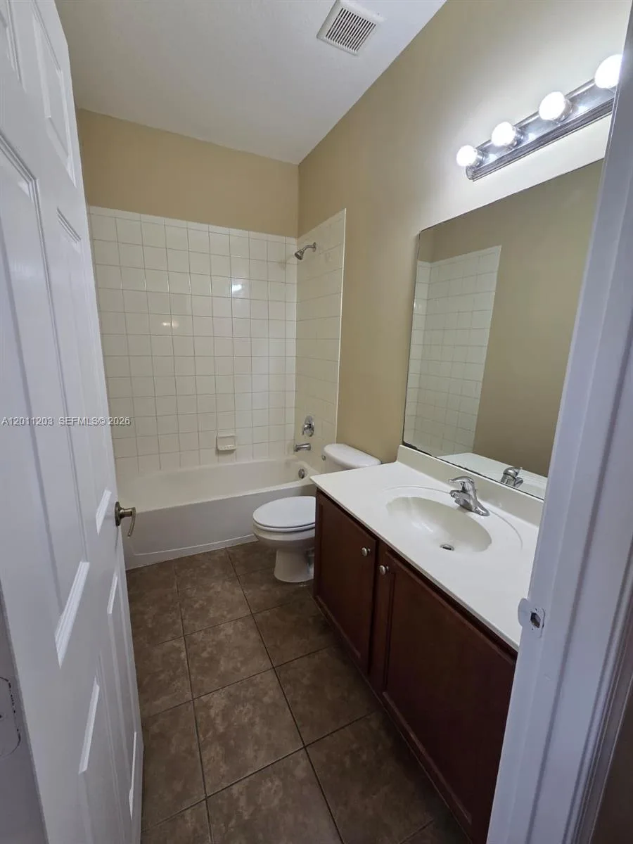 2851 W Prospect Rd # 404, Tamarac, FL 33309 photo 10