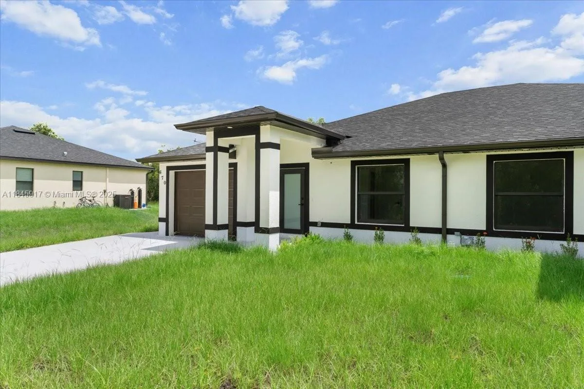 668/670 chemstrand st e, Lehigh Acres, FL 33974 photo 5